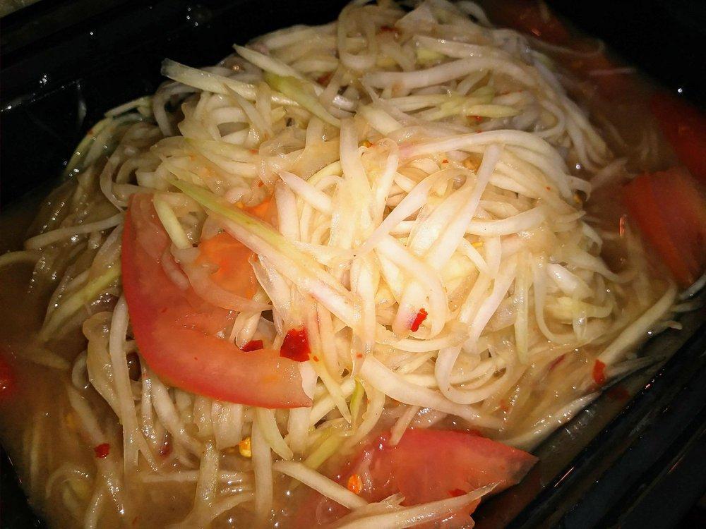 Papaya Salad · Shredded papaya, tomato and chili mixed with house special sauce and lime served with cabbage.