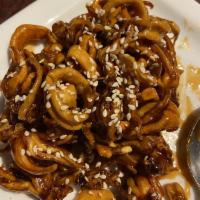 Honey Squid · Extra crunchy baby squid with tentacles in mild soy-honey sauce.