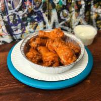 Buffalo Wings · 10 pieces. Baked. Side of ranch included