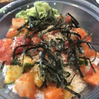 Rainbow Bowl · Tuna, salmon, yellow tail, massago, cucumber, avocado, crunch, ginger and wasabi sauce.