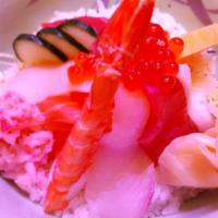 Chirashi · A variety of fresh thinly sliced salmon, tuna, yellowtail, flounder, crab meat, salmon roe, ...