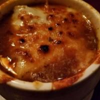French Onion Soup · Herb crostini, melted Swiss & Provolone cheeses