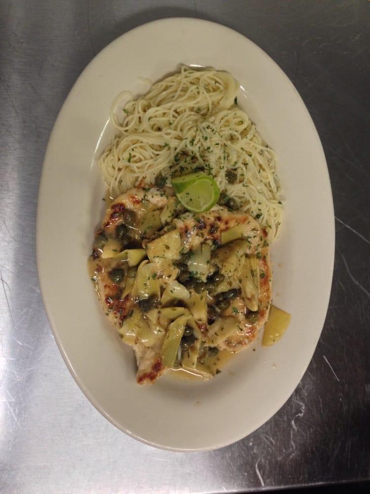 Chicken Piccata · Butter garlic angel hair pasta, chicken, capers and artichokes served in white wine lemon butter sauce.