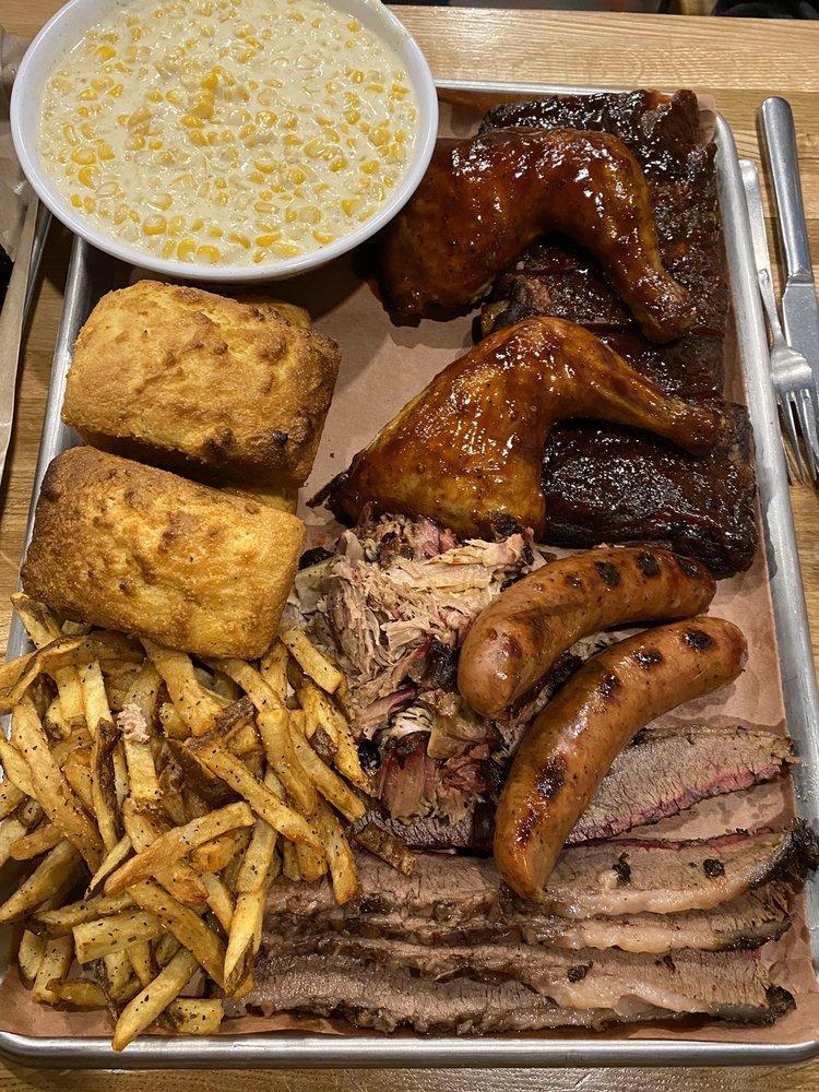 Judges Tray · 2 – 1/4 chicken, 1/2 rack ribs, 1/2 lb. chopped pork, 1/2 lb. brisket, 2 smoked sausage links, 2 shareable sides, 4 cornbread, house chips