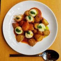 Patatas Bravas · a Jaleo favorite: fried potatoes with spicy tomato sauce and alioli