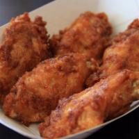 Korean Fried Chicken · Crispy and spicy fried chicken wings with choice of your sauce.