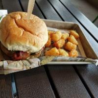 BBQ Bacon Burger · 1/4 lb. burger, white cheddar cheese, bacon, fresh jalapenos, BBQ sauce, and avocado spread....