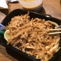 Chicken Pad Thai · Flat rice noodle with sweet and sour peanut sauce.