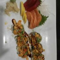 Lovely Roll · Crabmeat, cucumber, cream cheese, grilled asparagus inside deep fried topped with spicy scal...