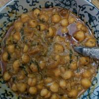 Channa Masala · Chic peas cooked in special blend spices and gravy.
