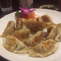 Gyoza · Pan-fried dumpling, choice of pork or vegetable.