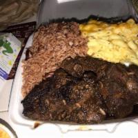 Oxtails Dinner · Served with 2 sides and corn bread.