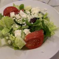Greek Salad · Mixed greens, tomato, cucumber, olives, feta cheese, dolmades, onions, pepper and pepperonci...