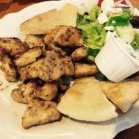 Chicken Souvlaki Platter · Includes pita, Greek salad, tzatziki and french fries.