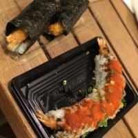 Tiger Maki · Uramaki with shrimp tempura, kanimi crab and cucumber. Topped with spicy ahi. Finished with ...