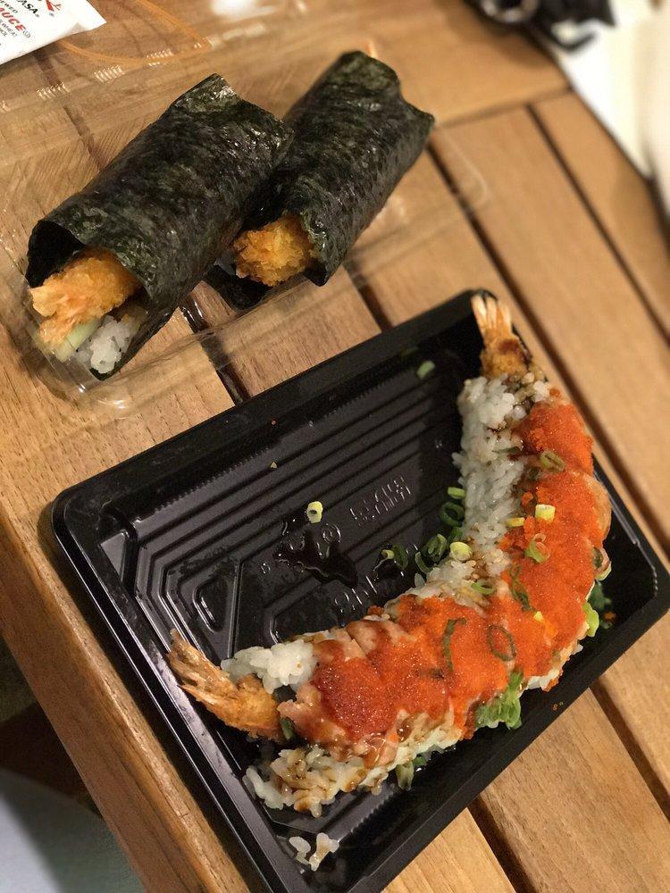 Tiger Maki · Uramaki with shrimp tempura, kanimi crab and cucumber. Topped with spicy ahi. Finished with teriyaki sauce, masago and green onions.