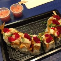 Tornado Maki · Uramaki with shrimp tempura, kanimi crab and cucumber. Topped with extra spicy ahi and light...