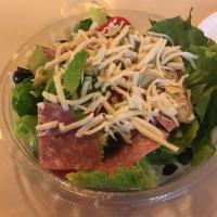 Antipasto Salad · Romaine hearts, salami, cherry tomatoes, black olives, roasted red peppers and artichoke hea...