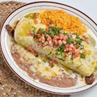 Burrito Verde · Flour tortilla stuffed with steak or grilled chicken, beans, rice, and cheese, topped with c...