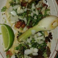 Carnitas · Chunky pork seasoned with family’s recipe, spices and cooked with grilled onions. Served wit...
