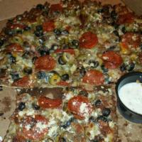Meat Lover Pizza · Canadian bacon, pepperoni, sausage, ground beef and bacon.