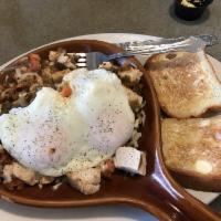 Santa Fe Skillet · Chicken, tomatoes, chorizo, green chili sauce. Topped with 2 eggs, melted cheese, hash brown...