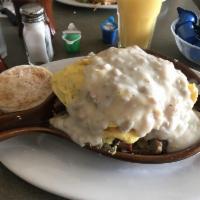 Meat Lovers Skillet · Chicken fried steak, bacon, sausage, ham and sausage gravy. Topped with 2 eggs, melted chees...