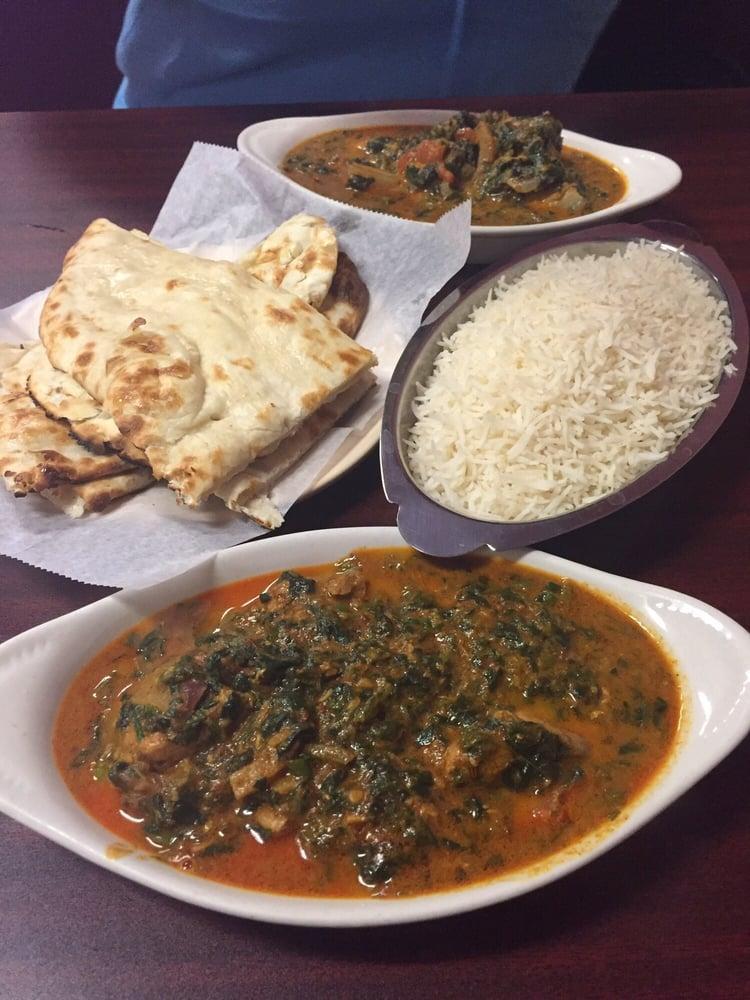 Kukhura Ra Saag · Chicken cooked with spinach.