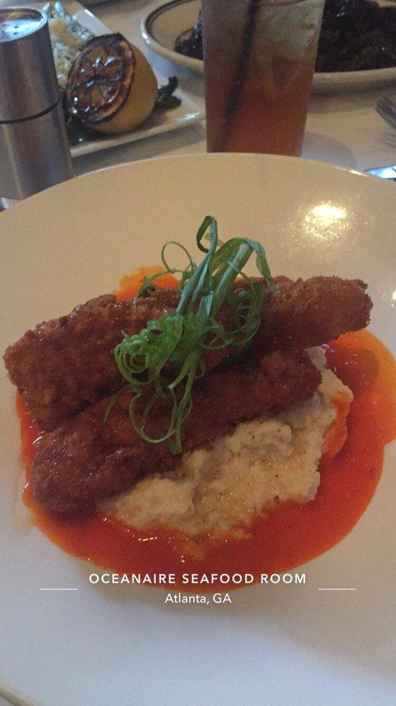 Chicken Fried Lobster · Truffled honey, cheesy grits and house hot sauce.