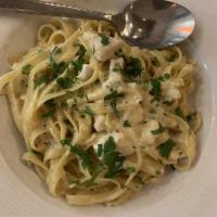 Garlic Cream Fettuccine · Our garlic Parmesan cream sauce with fresh Italian parsley. Vegetarian.