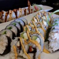 Philadelphia Roll · Smoked salmon, cream cheese, and avocado wrapped in seaweed and rice.