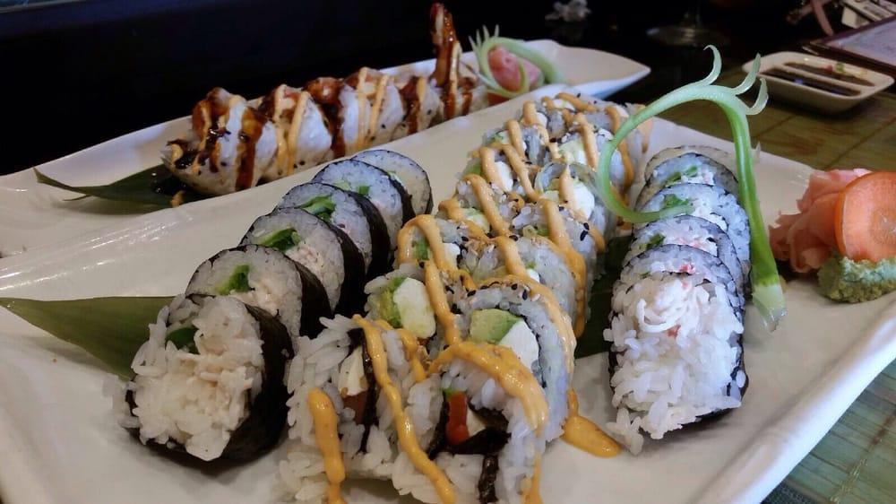 Philadelphia Roll · Smoked salmon, cream cheese, and avocado wrapped in seaweed and rice.