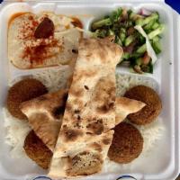 Falafel Plate · Served with rice, hummus, salad, charbroiled tomato, salad, and bread.