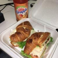 Cafe 51 Classic Sandwich · Turkey, bacon, avocado, Swiss cheese, lettuce, tomatoes and mayo on a croissant.