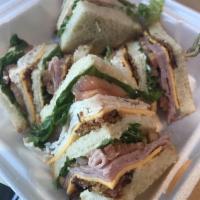 Signature Club Sandwich · Triple decker! Ham, turkey, bacon, Swiss cheese, lettuce, tomatoes and mayo.