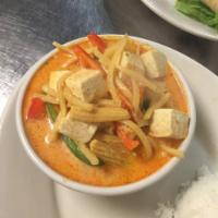 Red Curry · Curry paste with coconut milk, bamboo shoot, baby corn, pineapple, bell pepper and basil. Se...