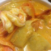 Yellow Curry · Curry paste with coconut milk, potato, carrot, onion and tomato. Served with steamed rice. S...