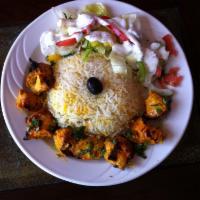 Chicken Kabob · Tender boneless chicken breast marinated in our secret house seasoning. Served with rice and...