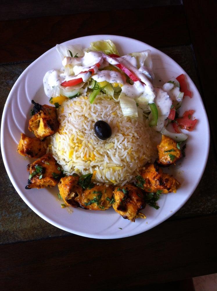 Chicken Kabob · Tender boneless chicken breast marinated in our secret house seasoning. Served with rice and salad.