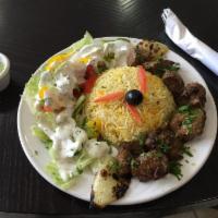 Lamb Kabob · Tender delicate chunks of lamb marinated in our special herbs and spices. Served with rice a...