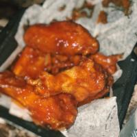 Traditional Wings · Traditional bone In wings with up to 2 flavors.