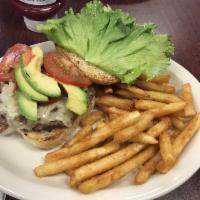 Avocado Burger · Topped with avocado, American cheese, lettuce, tomato, onions, pickle, mustard and mayo.