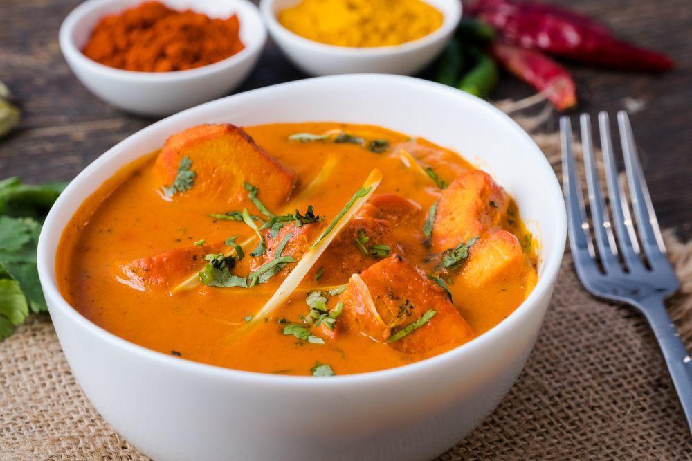Chicken Tikka Masala · Tender chicken pieces are marinated, then finished in fenugreek flavored tomato sauce and cream.