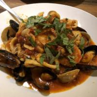 Seafood Risotto · Shrimp, scallops, clams, mussels, calamari and white wine marinara sauce.
