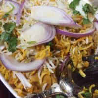 Hyderabadi Chicken Dum Biryani · House special rice dish made with aromatic basmati rice and chicken.