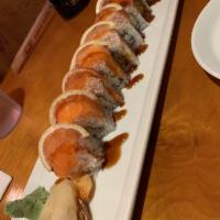 Eternal Sunshine Roll · Shrimp tempura, cucumber, avocado with crab meat, salmon and lemon on top.