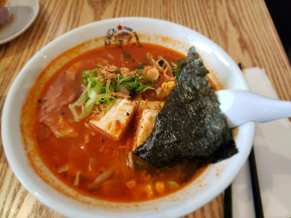 Tomato Ramen · Tomato broth, mushroom tempura, tofu, 1/2 soft-boiled egg, shiitake, spinach, beansprout, corn, broccoli, and 7 spices. Vegetarian or vegan options are available.