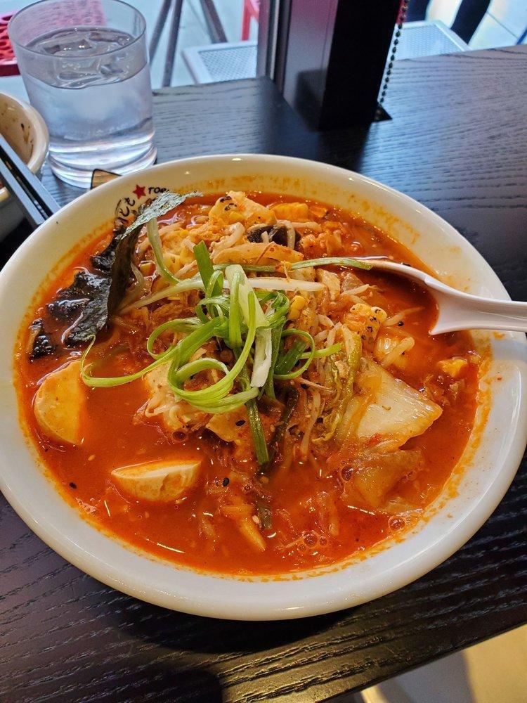 Kimchee Ramen · Kimchee broth, kimchee, tofu, 1/2 soft-boiled egg, shiitake, spinach, beansprout, organic mushroom medley, corn, broccoli, and 7 spices. Vegetarian or vegan options are available. 