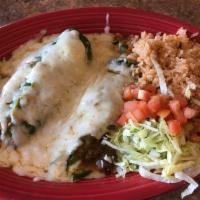 Traditional Chile Relleno Platter · 2 Poblano peppers roasted, stuffed with white jack cheese, battered with whipped eggs and de...