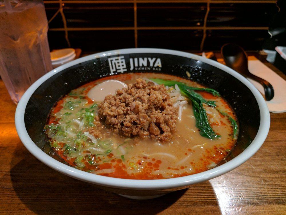 Spicy Umami Miso Ramen · Pork broth: ground pork soboro, bean sprouts, green onion, bok choy and chili oil. Served with thick noodles.
